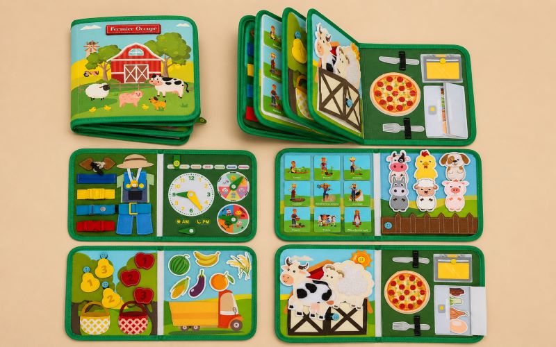 Busy board bébé en tissu sur le thème de la ferme avec activités Montessori, animaux à manipuler, chiffres et jeux éducatifs transportables.